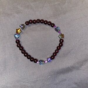 Gold and Purple Glass Beaded Bracelet with Elegant Design